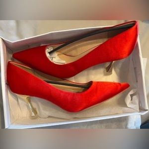 Women’s size 8 red pumps